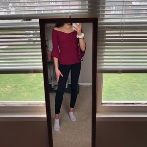 Wine colored off the shoulder blouse by Candie’s